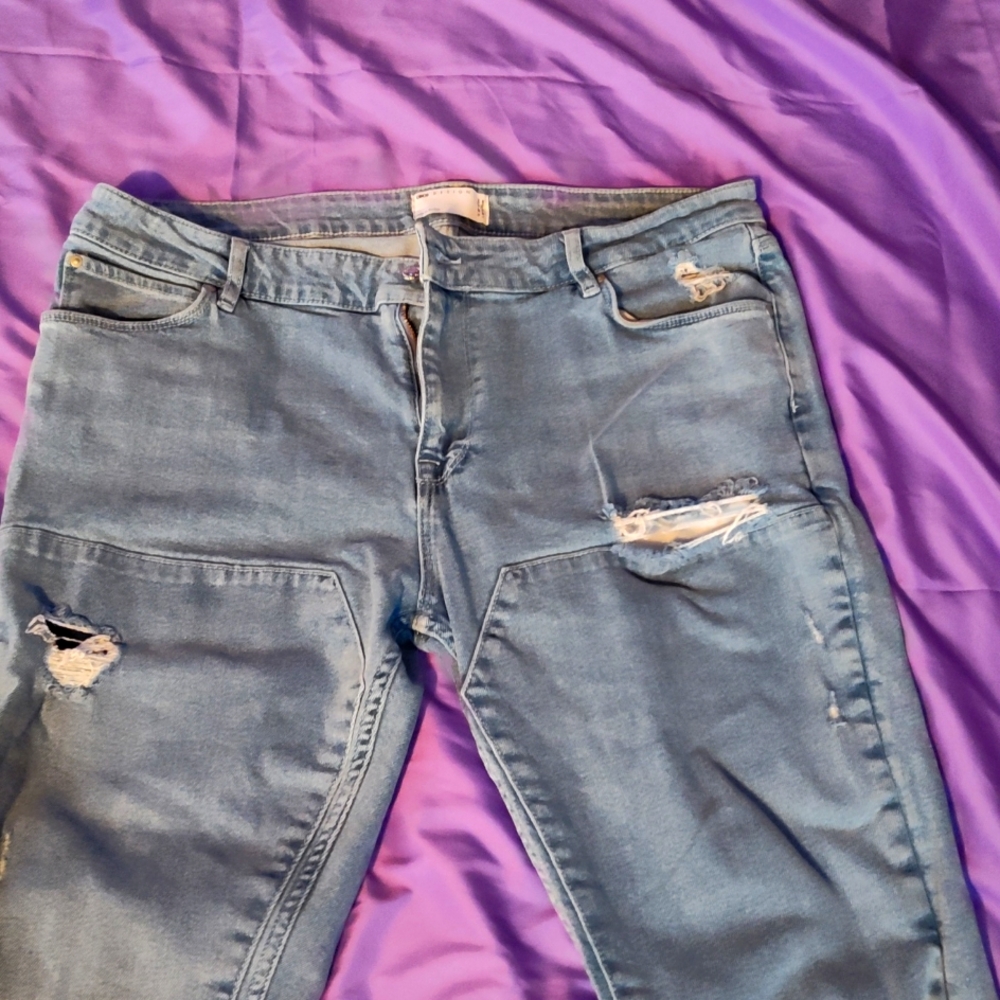 Men's jeans Blue holes in them that's the style with asos